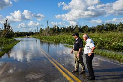 Patronis on flooded road in Manatee County
