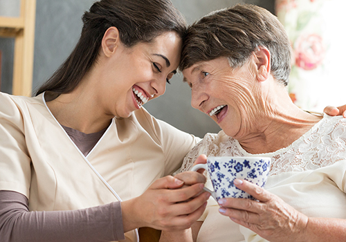 Long-Term-Care_th happy healthcare worker with senior
