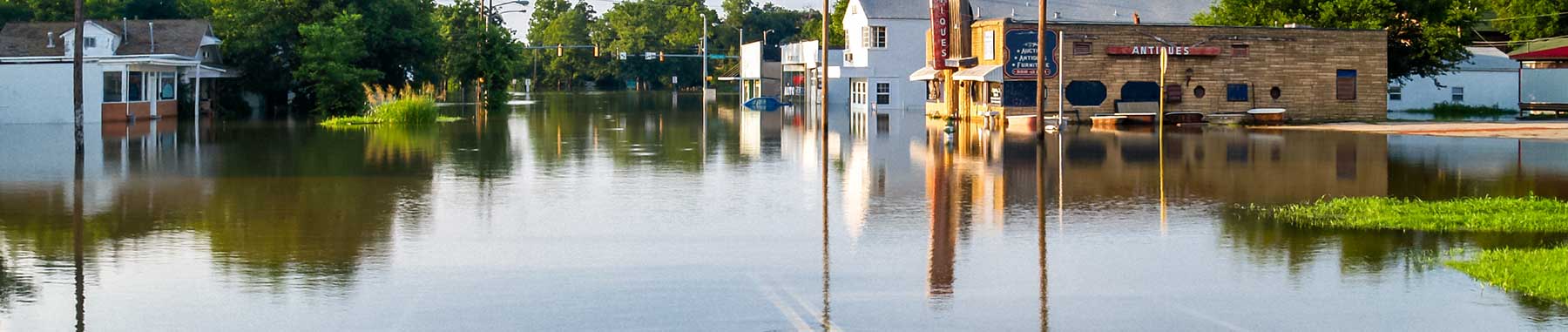 Flooded downtown area with one foot standing water.