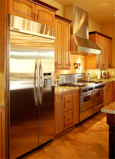 Kitchen scene with stainless refrigerator and stove